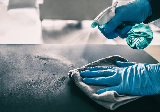 Sanitizing a surface with professional spray