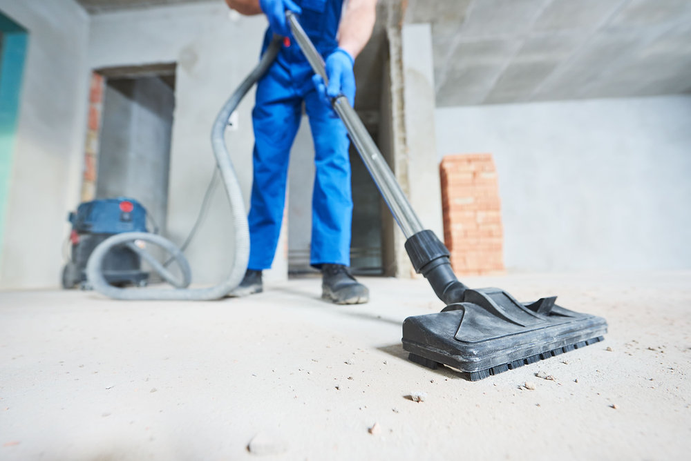 Post-construction dust removal with an industrial vacuum
